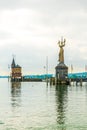 View of a lighthouse with a famous revolving statue situated in the port of Konstanz, bodensee, Germany....IMAGE Royalty Free Stock Photo