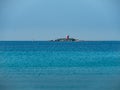 View of the lighthouse in front of the port