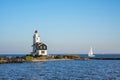 View of lighthouse near the Marken village, Netherlands. Waterland district near Amsterdam