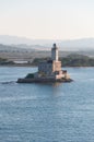 A view of lighthouse in Olbia gulf on sunset hour Royalty Free Stock Photo