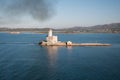 A view of lighthouse in Olbia gulf on sunset hour Royalty Free Stock Photo