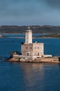 A view of lighthouse in Olbia gulf on sunset hour Royalty Free Stock Photo