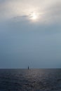 View of the lighthouse in the sea during twilight Royalty Free Stock Photo