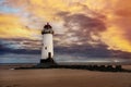view of lighthouse standing at the coast of Wales the North Sea at sinrise, United Kingdom Royalty Free Stock Photo