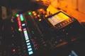 View of lighting technician operator working on mixing console workplace during live conference event, concert show broadcast, Royalty Free Stock Photo
