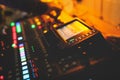 View of lighting technician operator working on mixing console workplace during live conference event, concert show broadcast, Royalty Free Stock Photo