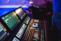 View Of Lighting Technician Operator Working On Mixing Console Workplace During Live Event Concert On Stage Show Broadcast, Light