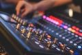 View of lighting technician operator working on mixing console workplace during live event concert on stage show broadcast, light Royalty Free Stock Photo