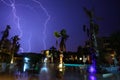 View of lightning strike over a rural farm field, lightning strikes the ground, strong thunder, lightning, dark clouds in the sky