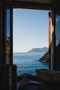 View of Ligurian Sea through an open window in Manarola, Cinque