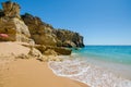 View of limestone cliffs of the Rabbit Beach Praia da Coelha in Albufeira, District Faro, Algarve, Southern Portugal