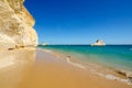 View of limestone cliffs of the Three Castles beach in Portimao, District Faro, Algarve, Southern Portugal