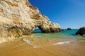 View of limestone cliffs of the Three Castles beach in Portimao, District Faro, Algarve, Southern Portugal