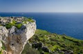 View of limestone rock, Mediterranean sea and the island of Filfla from Dingli Cliffs, Malta