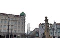 View of Lion`s Bridge from 1889 with lion sculptures, ancient buildings, intersection and traffic lights