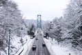 A View of Lions Gate Bridge covered in snow in Vancouver.