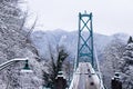 A View of Lions Gate Bridge covered in snow in Vancouver.