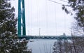 A View of Lions Gate Bridge covered in snow in Vancouver.