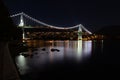 View of Lions Gate Bridge in Vancouver Canada at night from Stanley Park Royalty Free Stock Photo