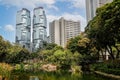 View of the Lippo Centre twin towers skyscraper from Hong Kong Park in Hong Kong Royalty Free Stock Photo