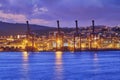 View of Lisbon port with port cranes in the evening Royalty Free Stock Photo