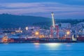 View of Lisbon port with ship and port cranes in the evening Royalty Free Stock Photo