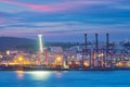 View of Lisbon port with ship and port cranes in the evening Royalty Free Stock Photo