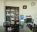 View of living room with modern wooden bookshelf