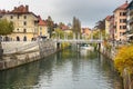 View of Ljubljanica river and Cobblers` Bridge or the Shoemakers` Bridge. Ljubljana. Slovenia Royalty Free Stock Photo