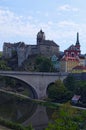 View of Loket Castle with colorful buildings over Ohre River by summer sunny day. Bohemia, Sokolov, Karlovarsky Region