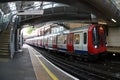 View of London underground train arriving at station - image