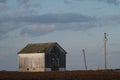 View of lonely old barn in agricultural field Royalty Free Stock Photo