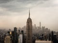 View of a lonely skyscraper in retro style with a dramatic sky Royalty Free Stock Photo