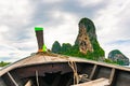 View from long tailed boat to limestone rock near Railay beach, Krabi Thailand. Rock is covered by green trees and bushes. Famous Royalty Free Stock Photo