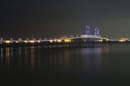 The lights of the suramadu bridge from afar at night