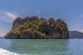 A view from a longtailed speed boat in Phang Nga Bay towards a large island in Thailand