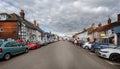 View looking along The High Street from the middle of the road in Aldeburgh, Suffolk, UK