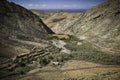 View of oasis valley in mountainous volcanic landscape. Fuerteventura, Spain.