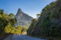 View down a road in Tijuca forest with Christ the Redeemer on top of Mount Corcovado in Rio de Janeiro, Brazil, South America Royalty Free Stock Photo