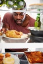 View Looking Out From Inside Of Refrigerator Filled With Unhealthy Takeaway Food As Man Opens Door Royalty Free Stock Photo