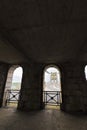 Looking out onto the eastern tower of the Menai Suspension Bridge & A5 traffic route from an undercover passage, Gwynedd, North Wa