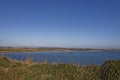 The view looking over the hedgerows of the East Coast of Scotland overlooking the wide sandy stretch of Lunan Bay.