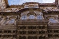 A view looking up at decorative windows on the Mehrangarh fort in the city of Jodhpur, Rajasthan, India