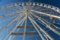 View looking up at a ferris wheel from below