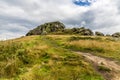 A view looking up to the summit of the Almscliffe crag in Yorkshire, UK