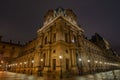 view of the Louvre at night in paris