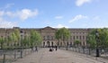 View of the Louvre Palace from the Bridge of Arts. On the bridge Royalty Free Stock Photo