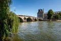 View of Louvre Palace and Pont Royal in Paris