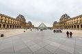 View of the Louvre Pyramid in the center of the Napoleon Courtyard of the Palais du Louvre.