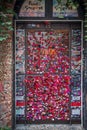 View of love notes and padlocks at Juliet`s house yard